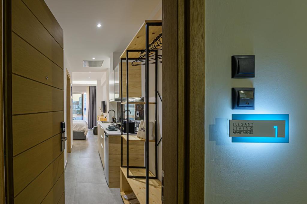 TV a/nebo společenská místnost v ubytování ELA apartments