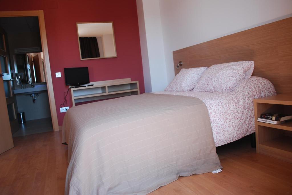 Postel nebo postele na pokoji v ubytování Hotel Mediterrani Express
