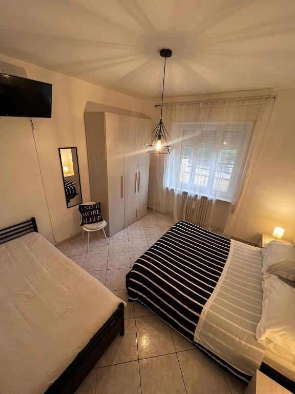 Łóżko lub łóżka w pokoju w obiekcie Pacific House