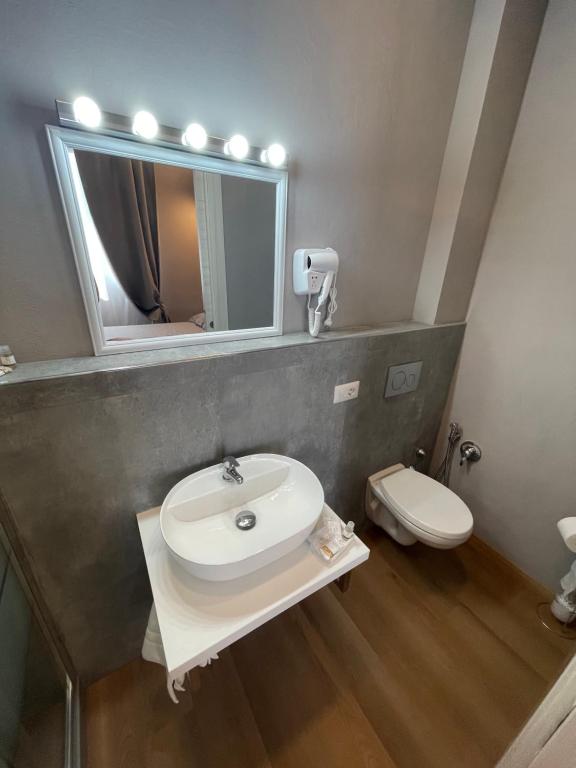Koupelna v ubytování Piccola Dimora B&B