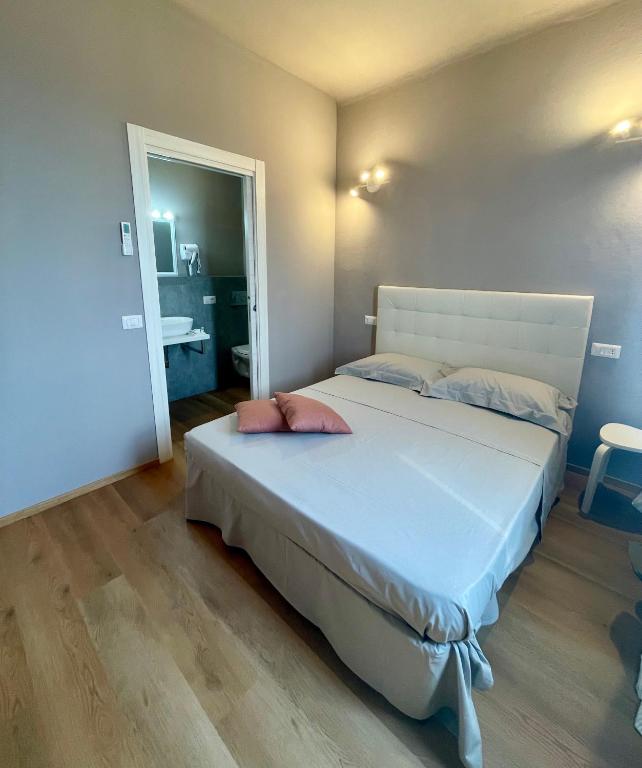 Postel nebo postele na pokoji v ubytování Piccola Dimora B&B