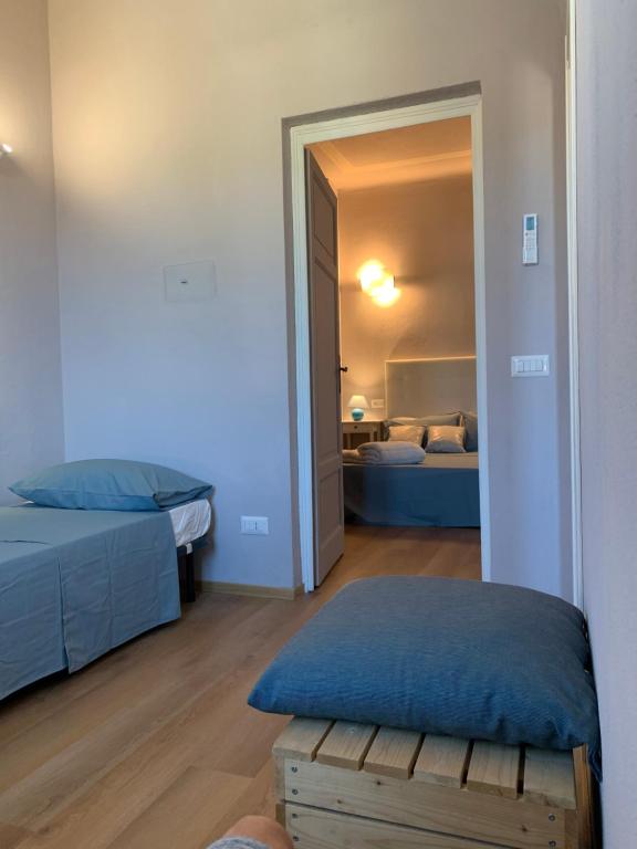 Postel nebo postele na pokoji v ubytování Piccola Dimora B&B