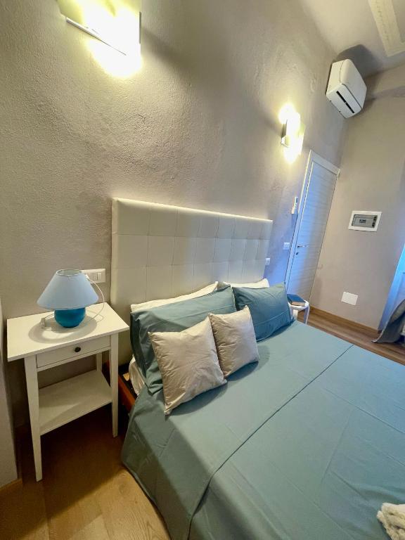 Postel nebo postele na pokoji v ubytování Piccola Dimora B&B