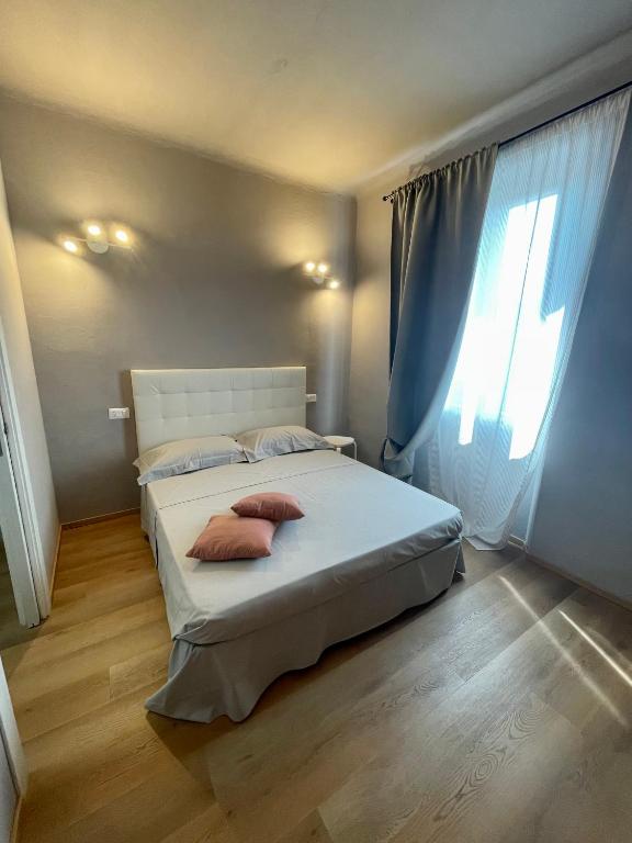 Postel nebo postele na pokoji v ubytování Piccola Dimora B&B