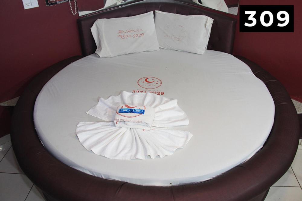 Cama o camas de una habitación en el Hotel l Motel 1001 Noites - Ceilândia