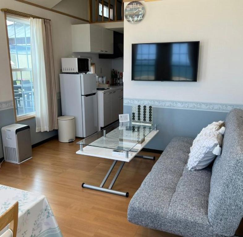 Kuchyň nebo kuchyňský kout v ubytování オーシャンリゾートshimaoドリームbeach