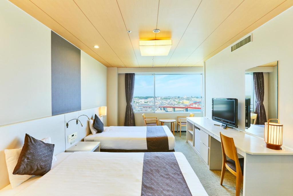 TV a/nebo společenská místnost v ubytování KAMENOI HOTEL Oarai