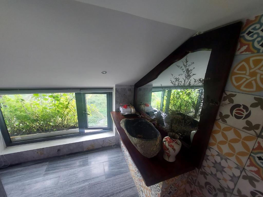 Posezení v ubytování Hoi An Ti Hon House