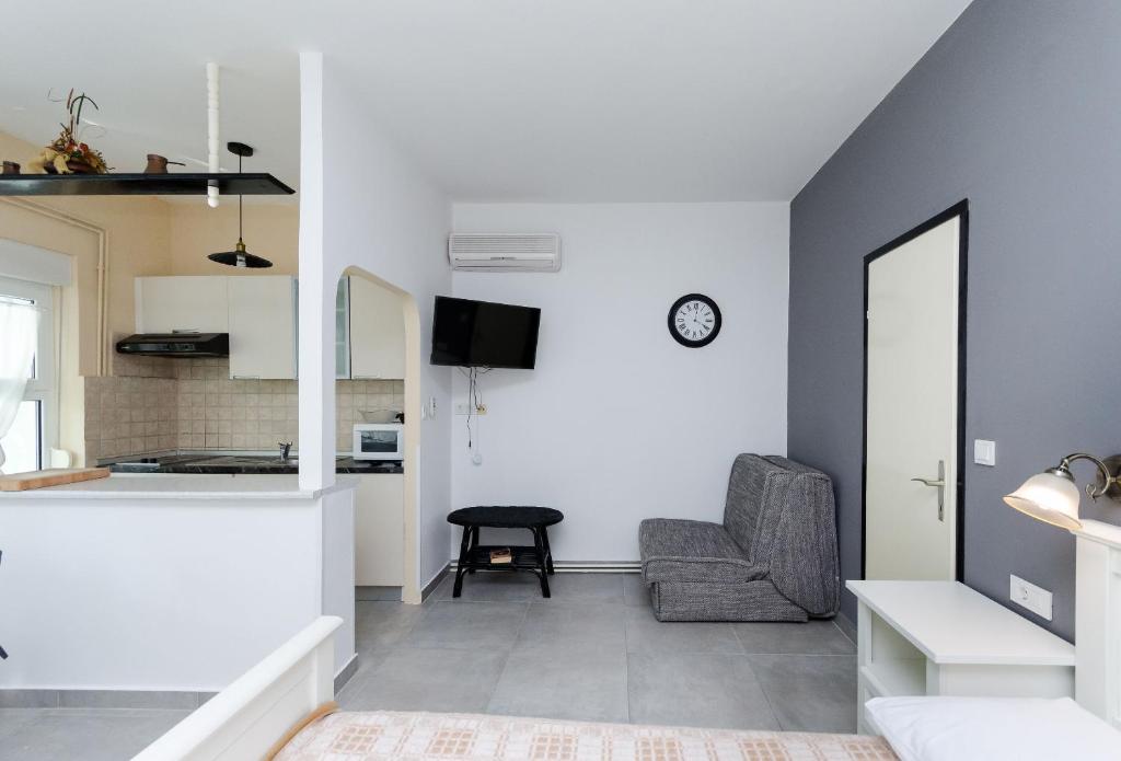 Kuchyň nebo kuchyňský kout v ubytování Apartments Marija G