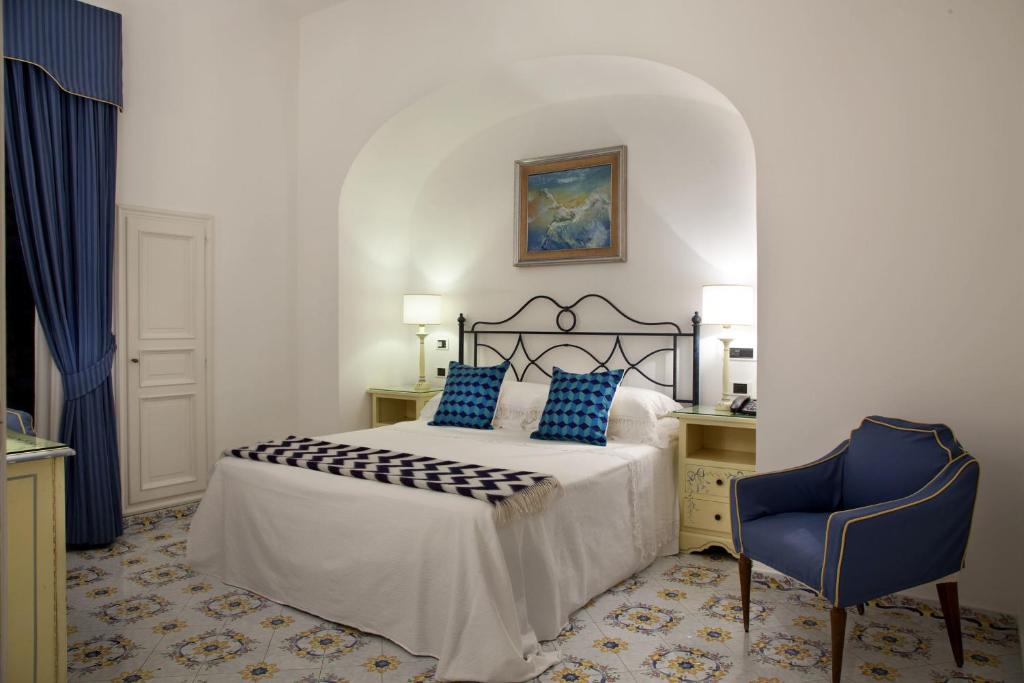 Postel nebo postele na pokoji v ubytování Hotel Canasta