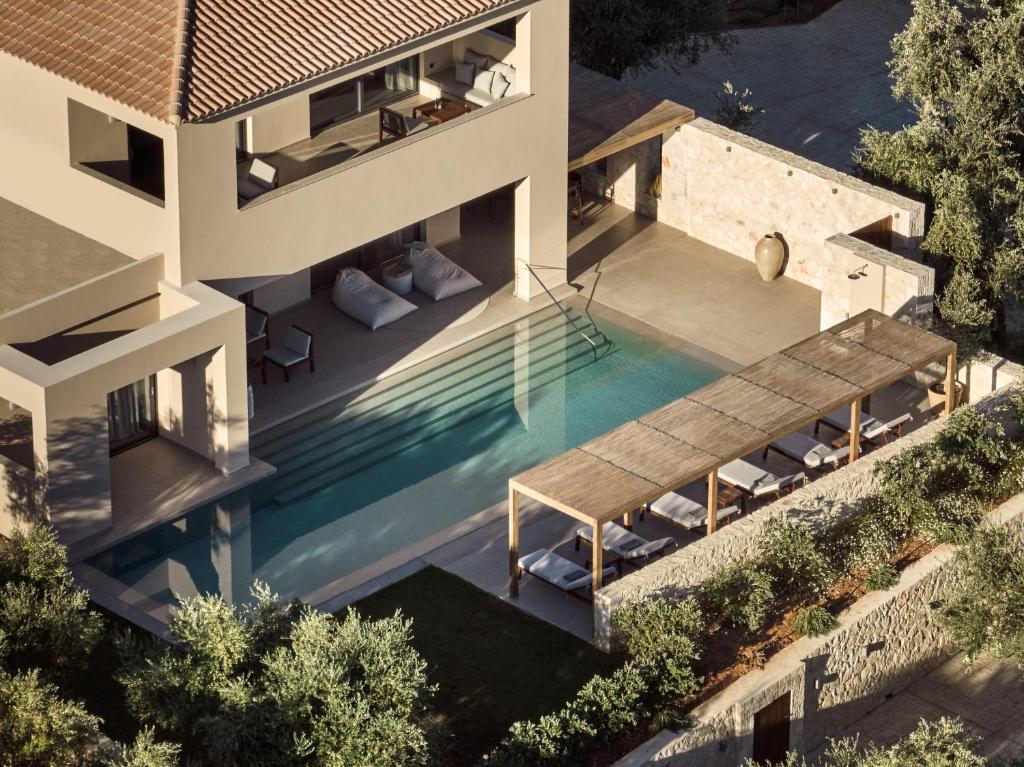 an aerial view of a house with a swimming pool at Cielo Luxury Villas in Zakynthos Town