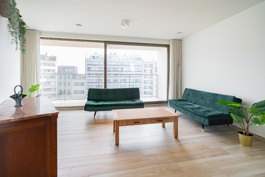 Un lugar para sentarse en Opera Square Apartments in the Center of Antwerp