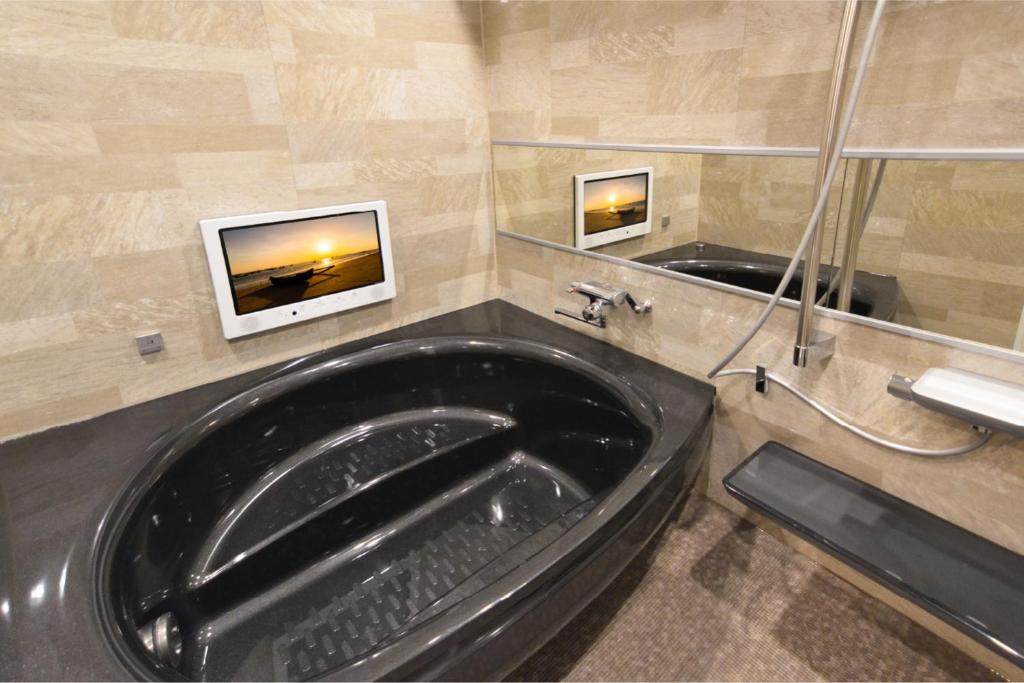 Koupelna v ubytování Hotel BaliBali 伊勢佐木