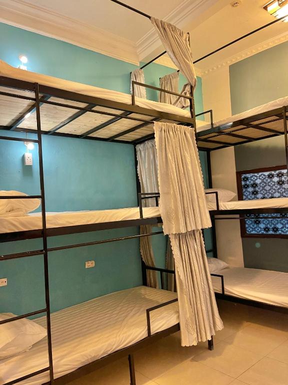Postel nebo postele na pokoji v ubytování Hanoi Jade Hostel