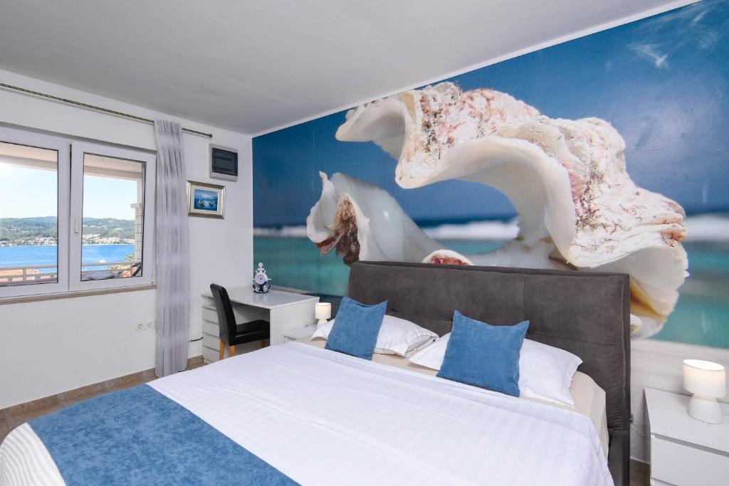 Postel nebo postele na pokoji v ubytování Holiday Villa Perna