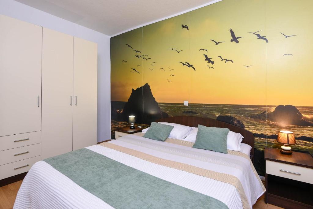 Postel nebo postele na pokoji v ubytování Holiday Villa Perna