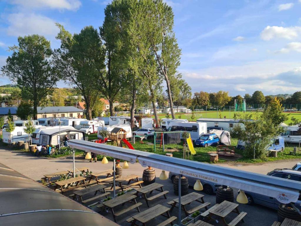 a view of a parking lot with a bunch of trailers at Hotel Formanka in Hustopeče