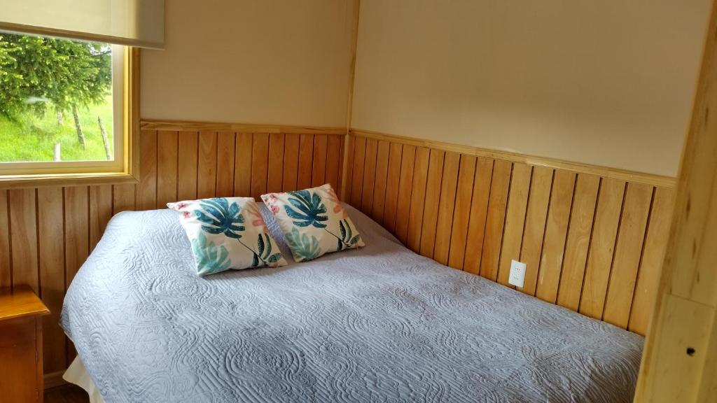 Postel nebo postele na pokoji v ubytování Cabañas Maullin, Las Chilcas