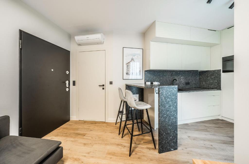 Kuchyňa alebo kuchynka v ubytovaní Rent like home - Krysiewicza 3
