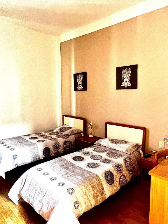Postel nebo postele na pokoji v ubytování Albergo pizzeria 76 06