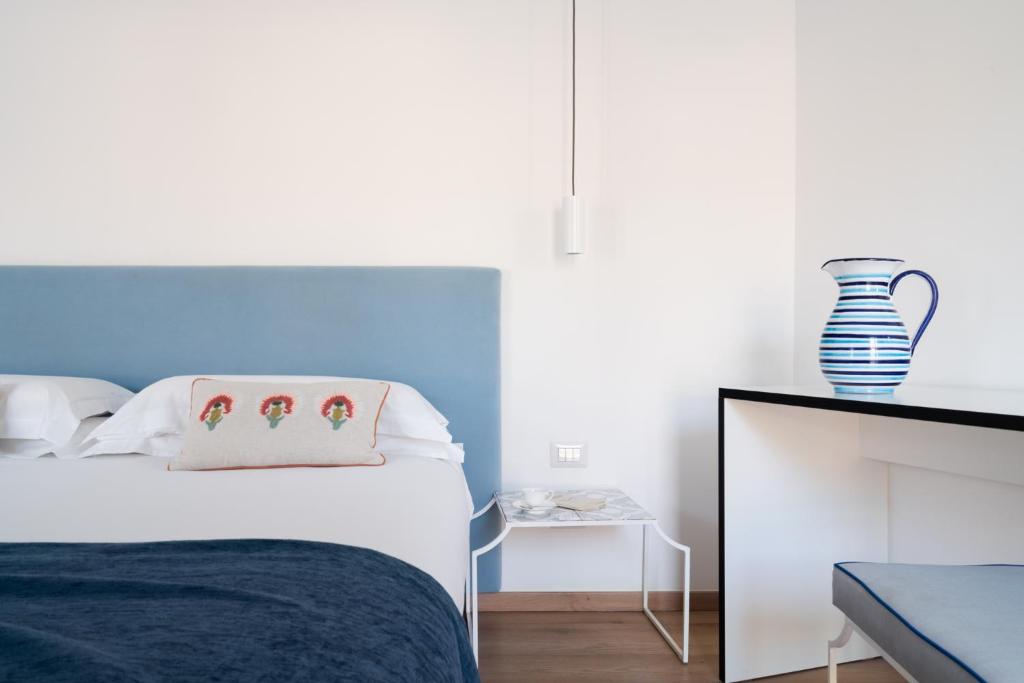 Posteľ alebo postele v izbe v ubytovaní Domo 20 Hotel & Rooftop