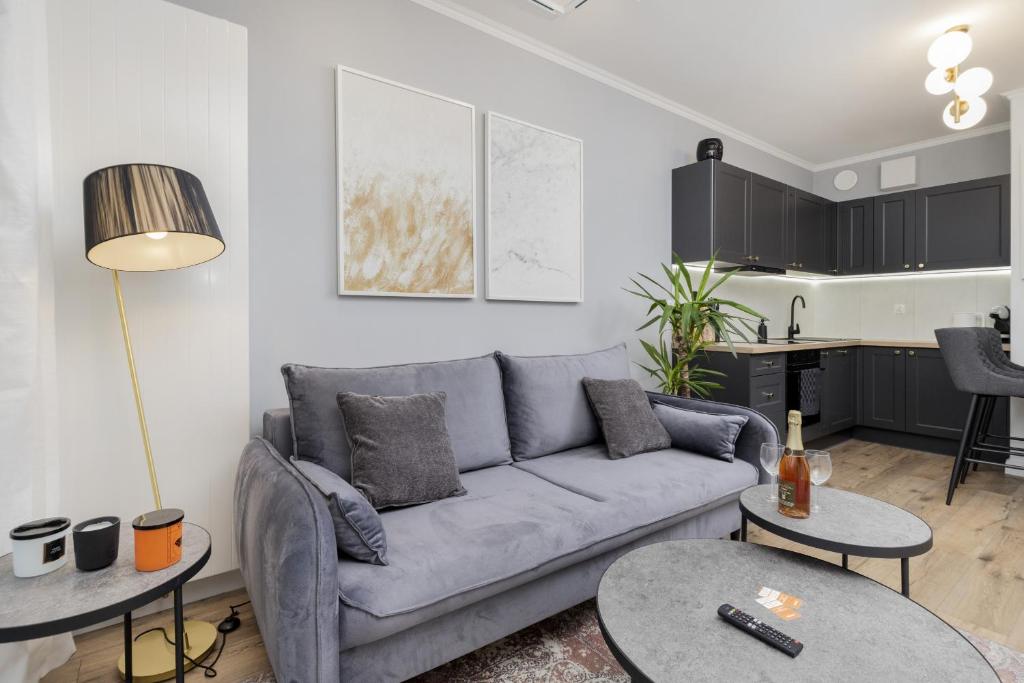 Posedenie v ubytovaní Gdynia Plac Unii Śródmieście Apartment by Noclegi Renters