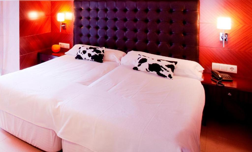 Postel nebo postele na pokoji v ubytování Hotel MU