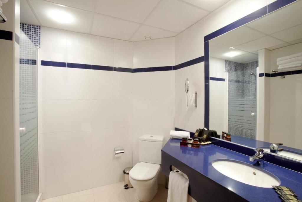 Koupelna v ubytování Hotel MU