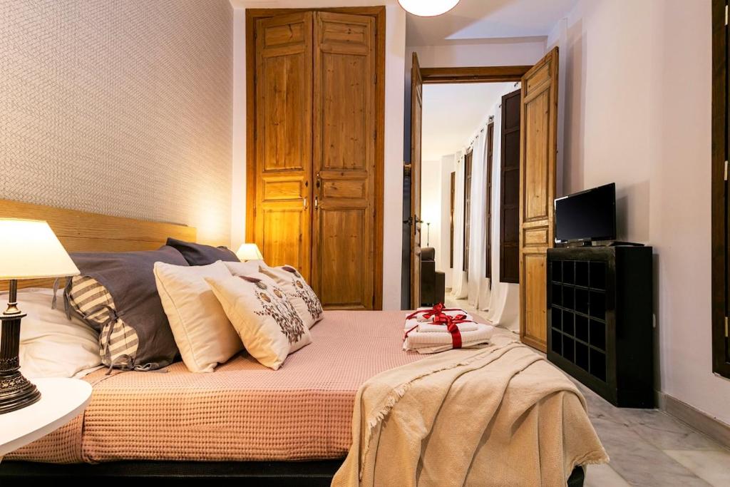 Telewizja i/lub zestaw kina domowego w obiekcie -MalagaSunApts- Premium Historical CityCentre