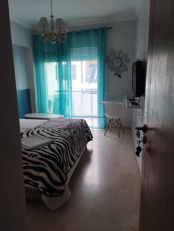 Postel nebo postele na pokoji v ubytování Chambre haut standing
