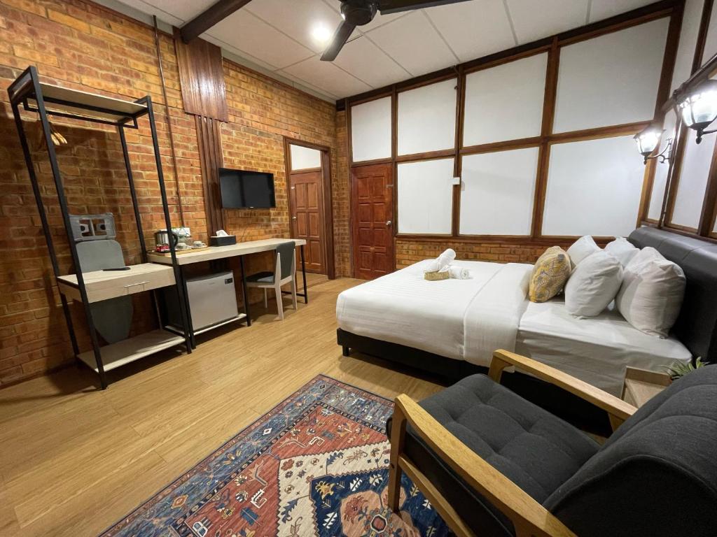 TV a/nebo společenská místnost v ubytování Api-api Eco Chalet