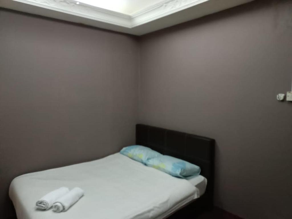 Postel nebo postele na pokoji v ubytování Hotel Tropicanna Pulai Point