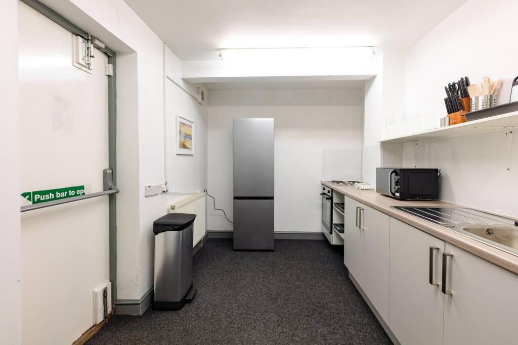 Kuchyň nebo kuchyňský kout v ubytování Midwood Lodge