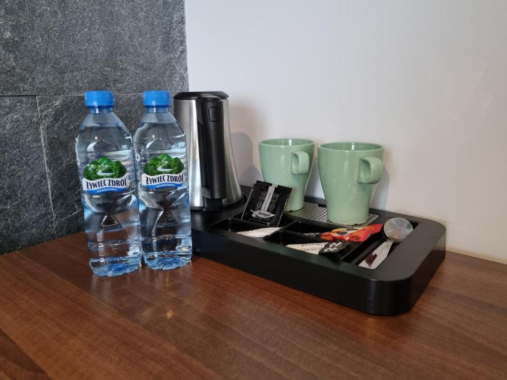 Příslušenství pro přípravu čaje a kávy v ubytování Terminal Hotel