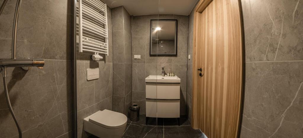 Kúpeľňa v ubytovaní Kazalnica Family&Conference Resort