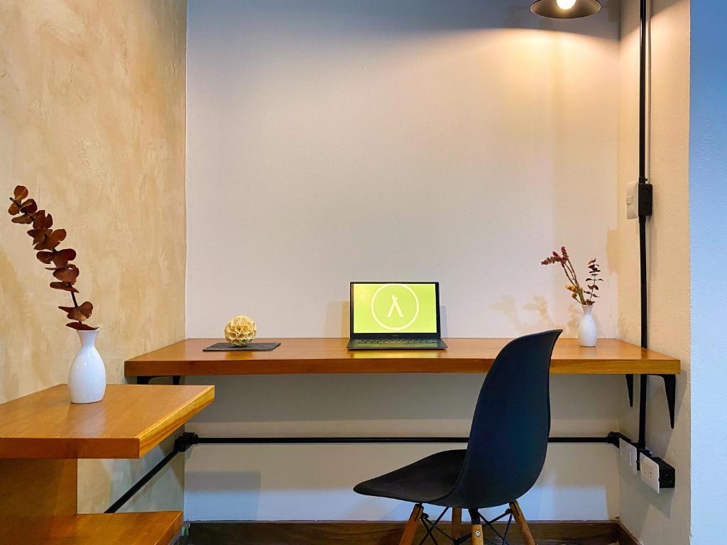 Uma TV ou centro de entretenimento em Humant Coliving - Cancún