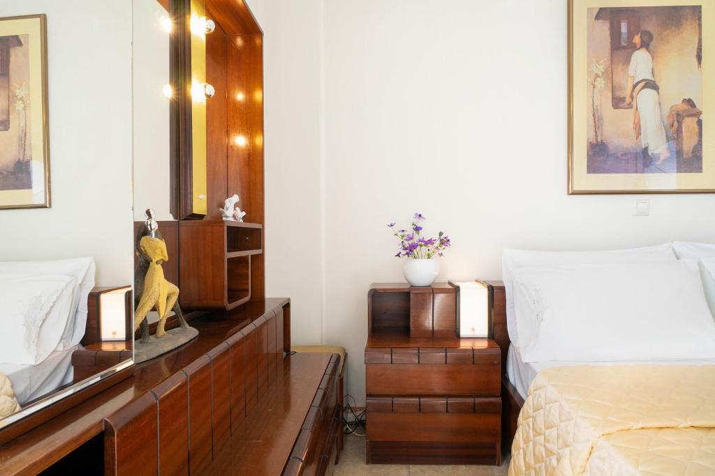 Łóżko lub łóżka w pokoju w obiekcie Port Apartment