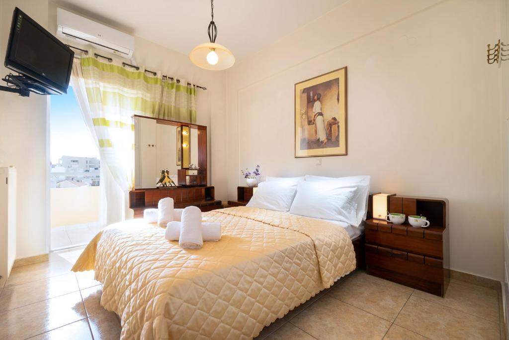 Łóżko lub łóżka w pokoju w obiekcie Port Apartment