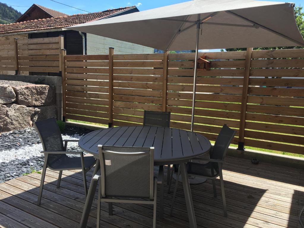 Patio nebo venkovní prostory v ubytování Les écureuils