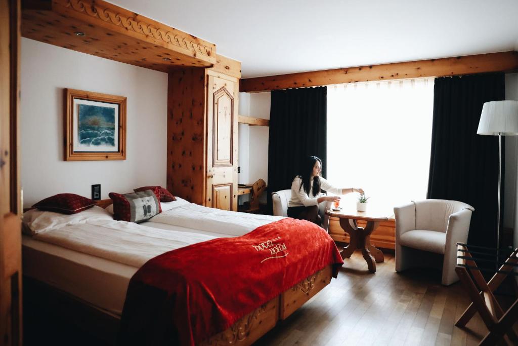 Letto o letti in una camera di Hotel Nolda