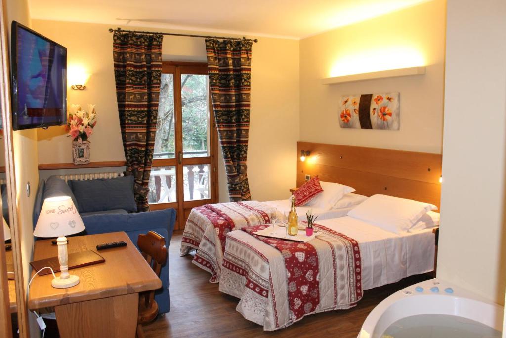 Postel nebo postele na pokoji v ubytování Grand Hotel Principe