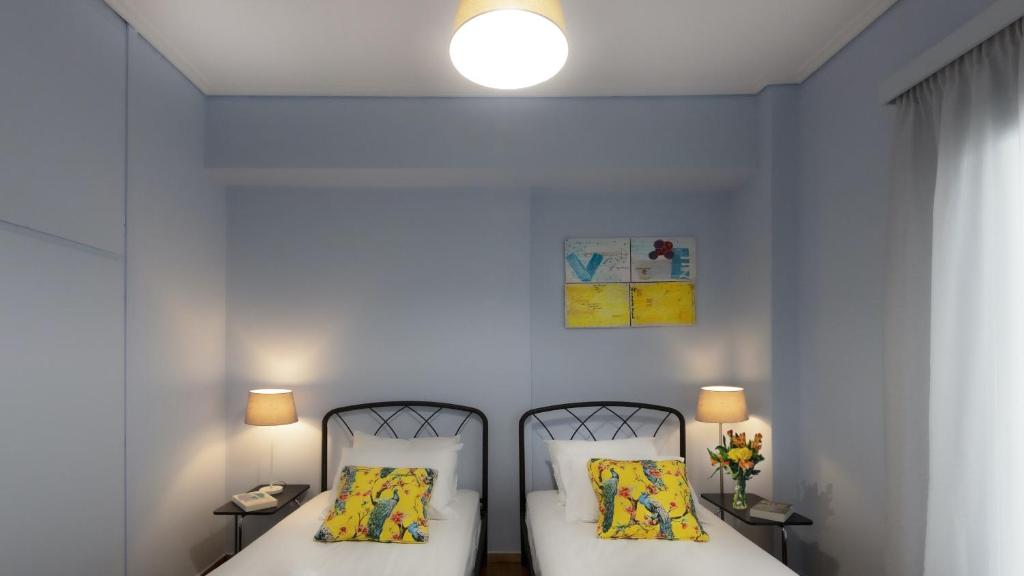 Posteľ alebo postele v izbe v ubytovaní Spacious 3 Bedroom apt near Acropolis museum