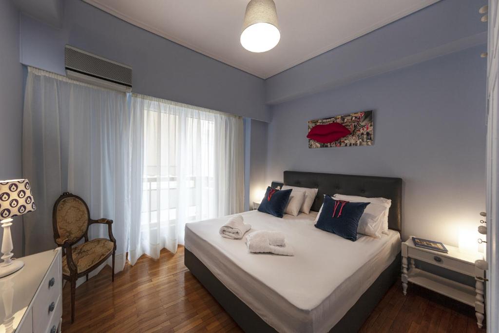 Posteľ alebo postele v izbe v ubytovaní Spacious 3 Bedroom apt near Acropolis museum