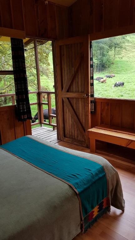 Postel nebo postele na pokoji v ubytování Finca Terra Viva