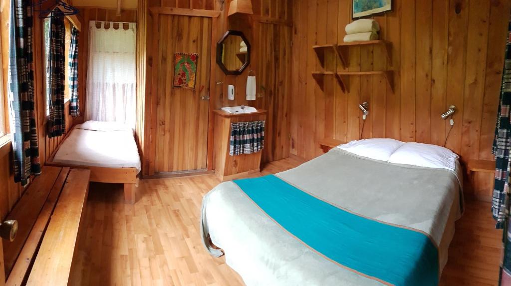Postel nebo postele na pokoji v ubytování Finca Terra Viva