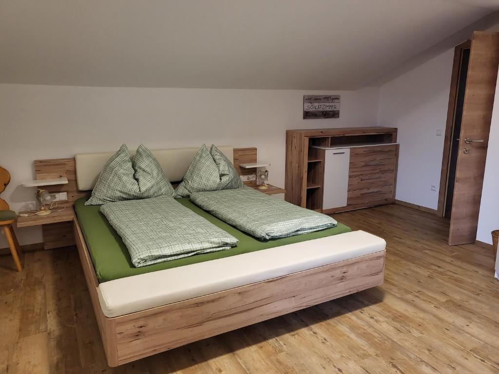 Postel nebo postele na pokoji v ubytování Saumerhof