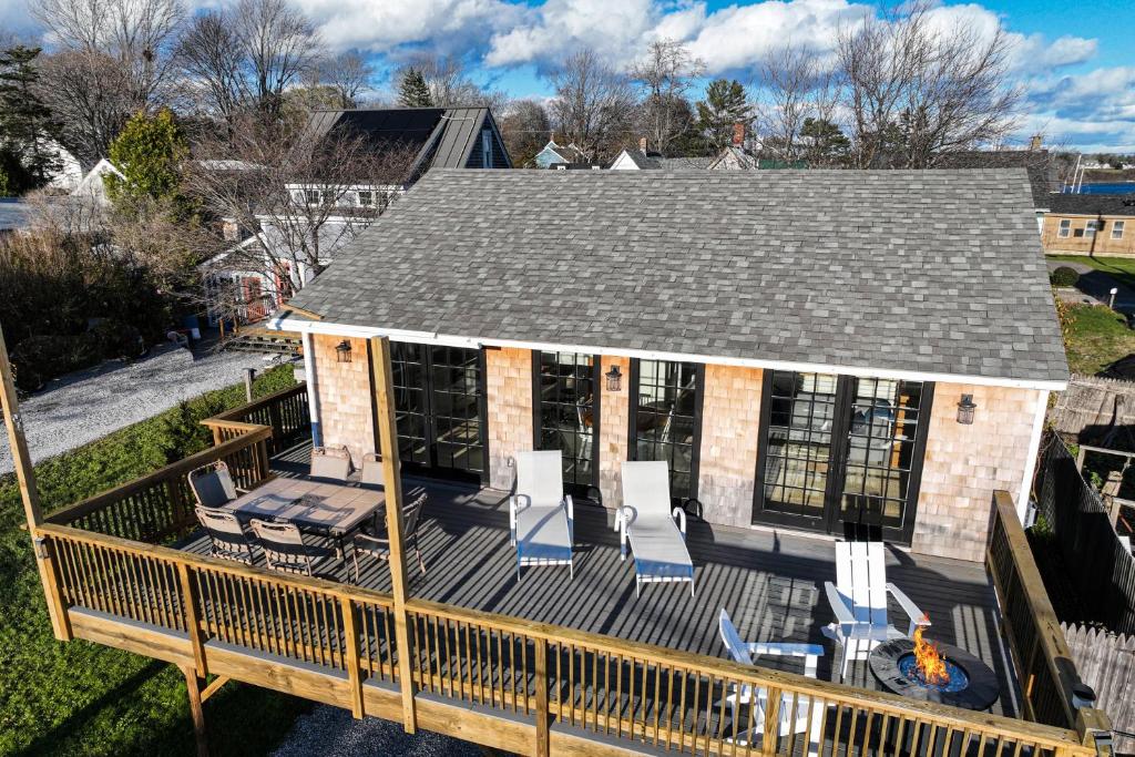 an aerial view of a house with a deck at Modern Harbor Retreat in Rockland