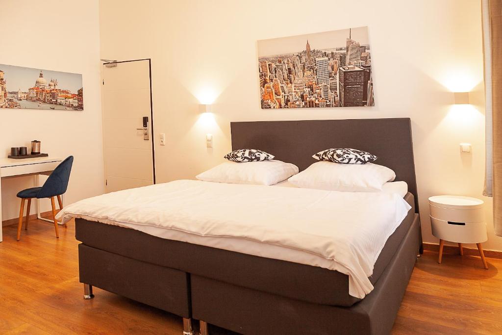 Postel nebo postele na pokoji v ubytování Hotel Soers