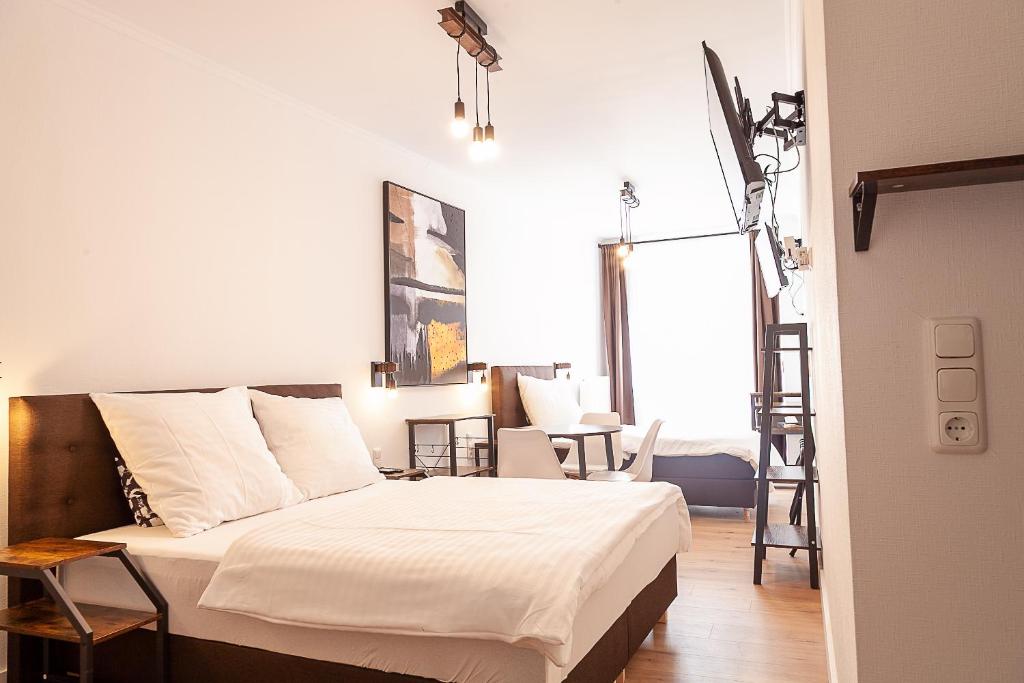 Postel nebo postele na pokoji v ubytování Hotel Soers