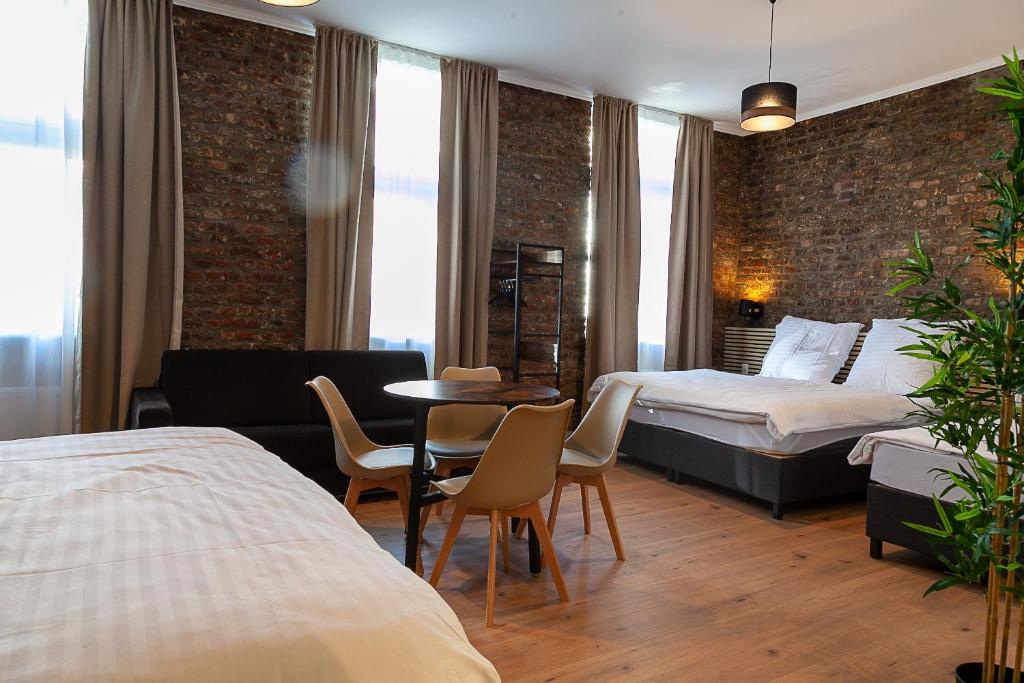 Postel nebo postele na pokoji v ubytování Hotel Soers